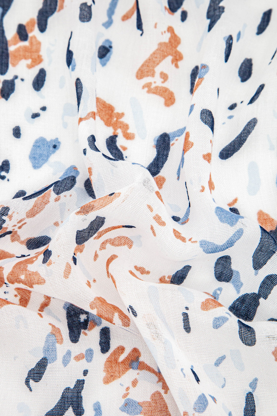 close up of the cream and navy blue abstract animal print pattern