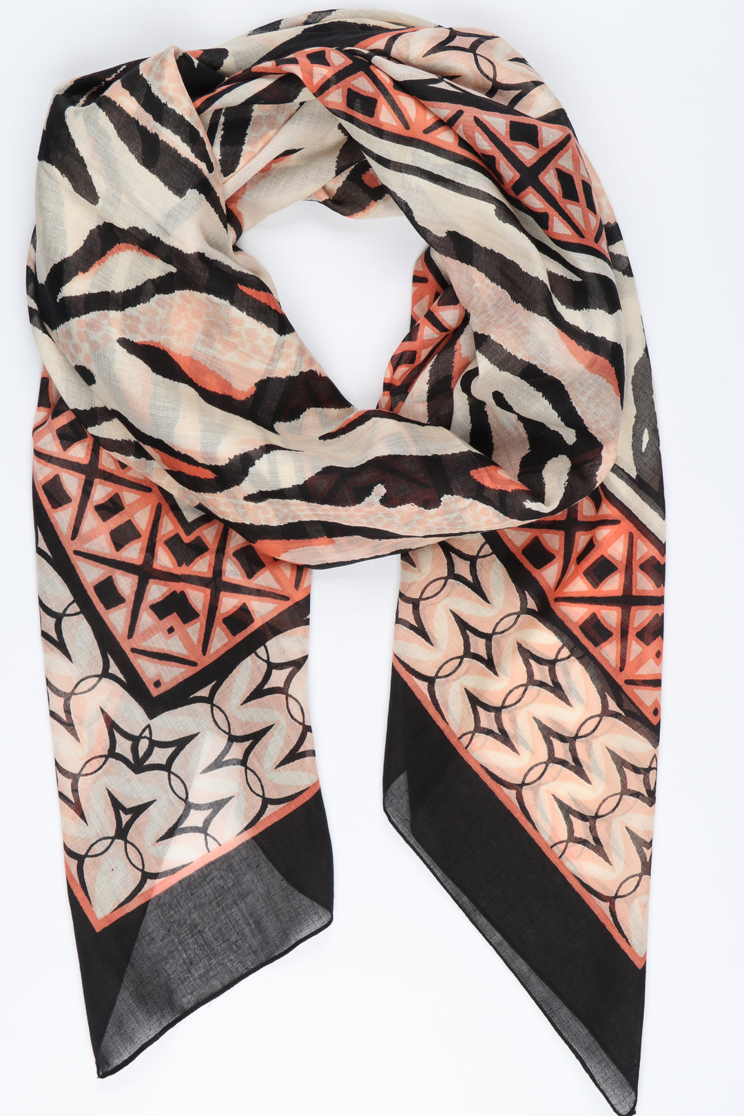 neutral beige and orange animal print scarf with a mosaic print border 
