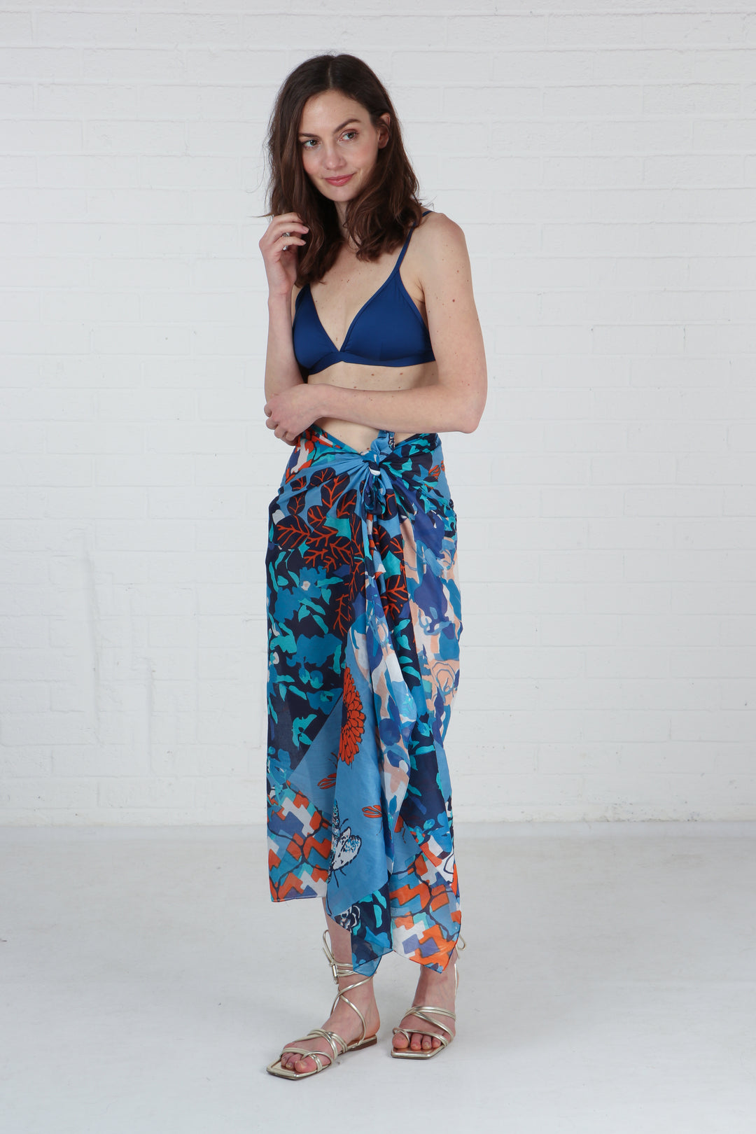 model wearing this blue cotton scarf as a beach coverup wrap
