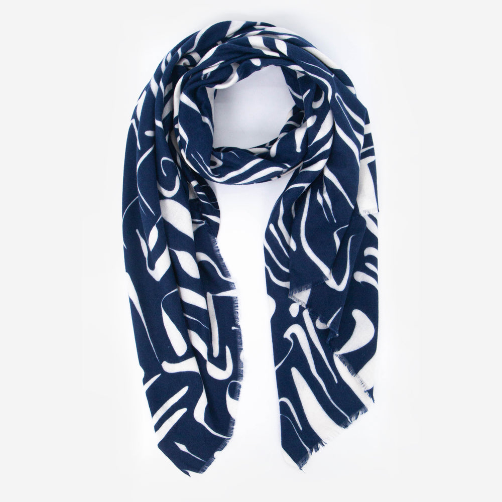 navy blue scarf with a contrasting white abstract print pattern all over