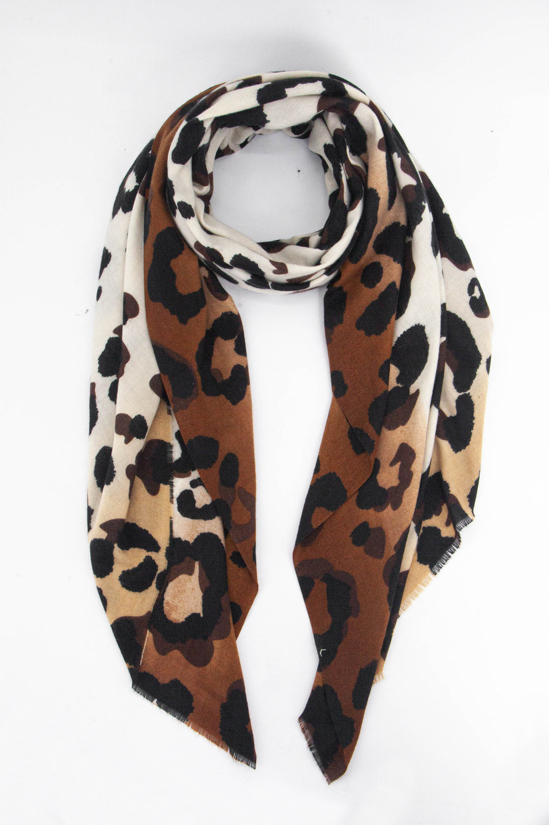 camel, brown and neutral beige ombre scarf with a bold large black leopard print pattern all over