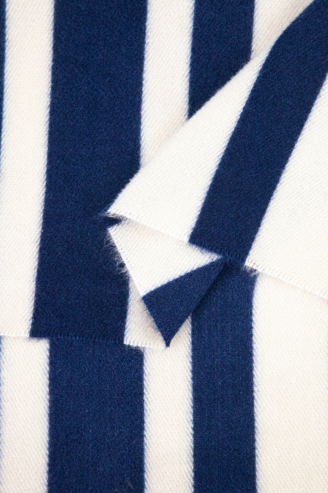 close up of the soft viscose fabric, the navy blue and cream colourways are clearly visible