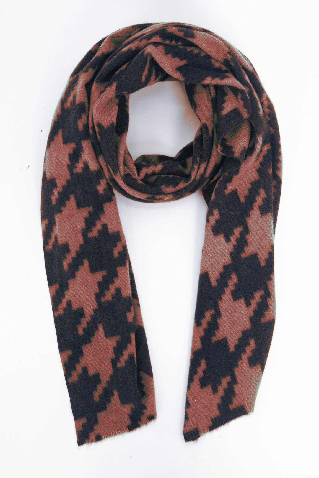 midweight winter scarf in rust coloured burnt orange and black in a bold large houndstooth pattern