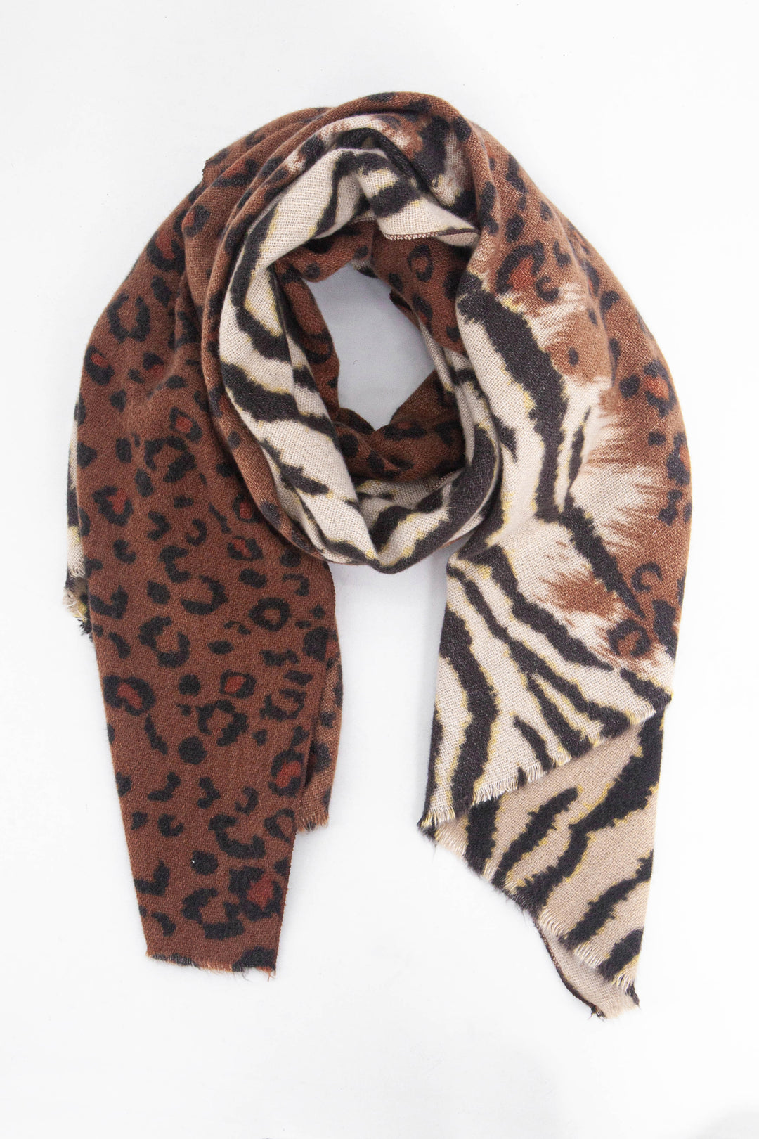 neutral tone midweight scarf with a pattern of contrasting animal prints including leopard print and zebra print