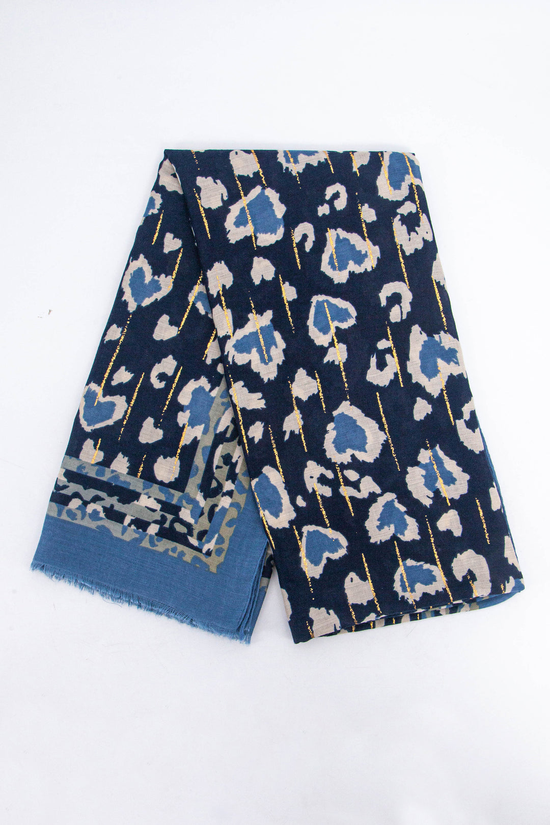 showing the scarf folded, the blue leopard print pattern and gold foil pattern is shown, the scarf also has a plain light blue border around the outside edge of the design. 