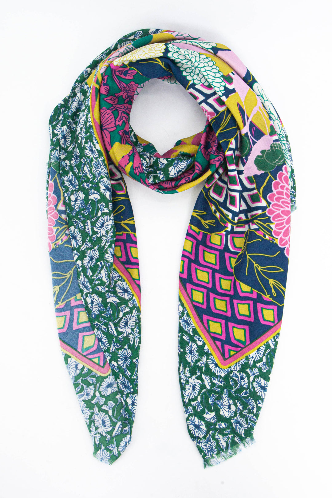 pink, yellow and blue geometric print scarf with a contrasting wide floral print border, the border is a medium green and has an ornate floral pattern.