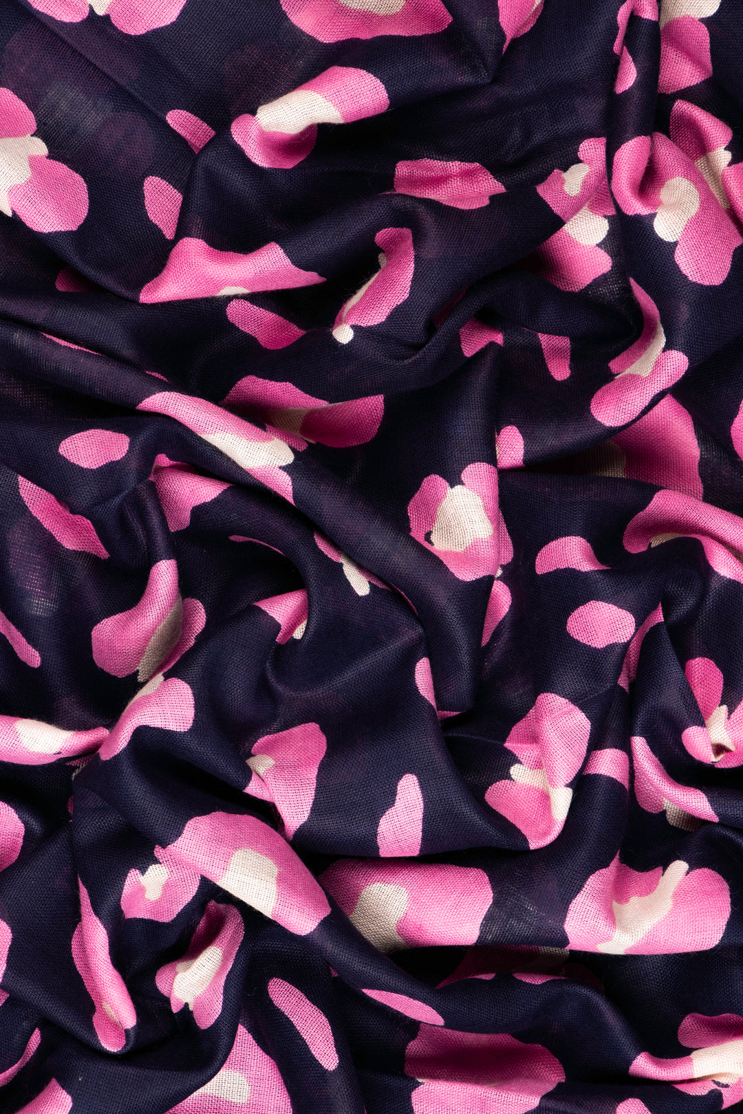 close up of the soft viscose fabric, the blue and pink colourways are clearly visible