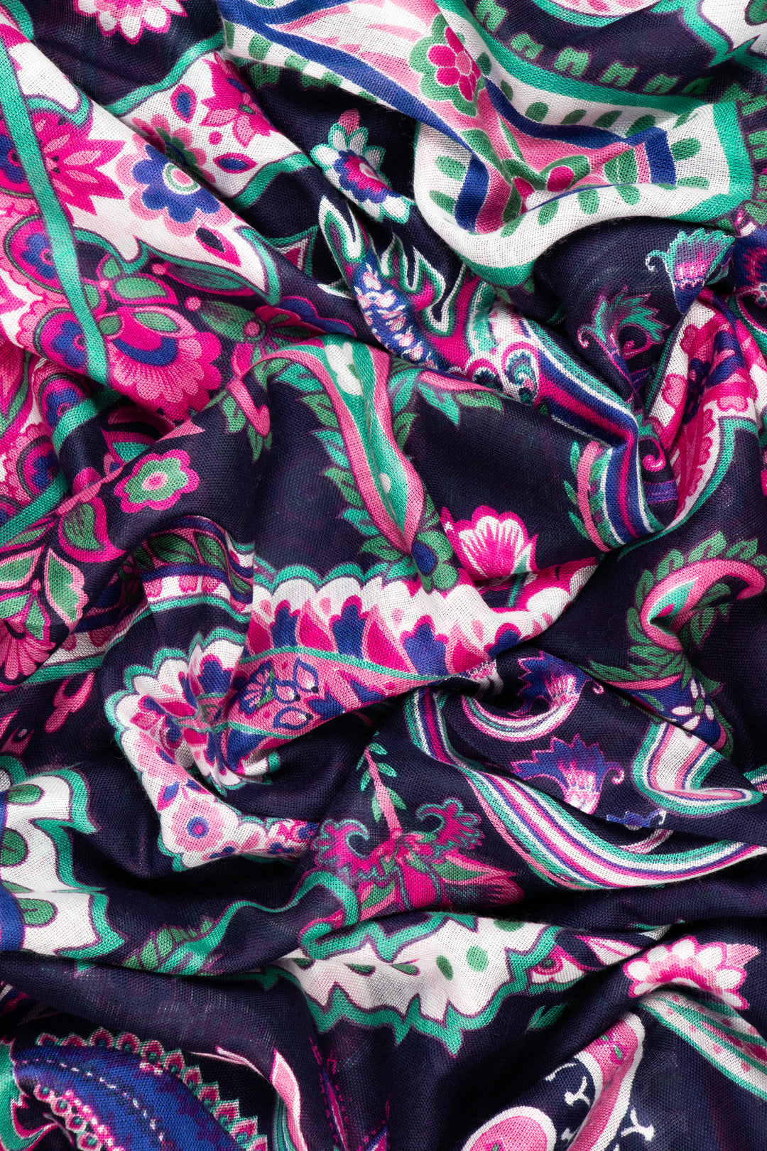 close up of the soft viscose fabric, the purple, pink and green colourways are clearly visible