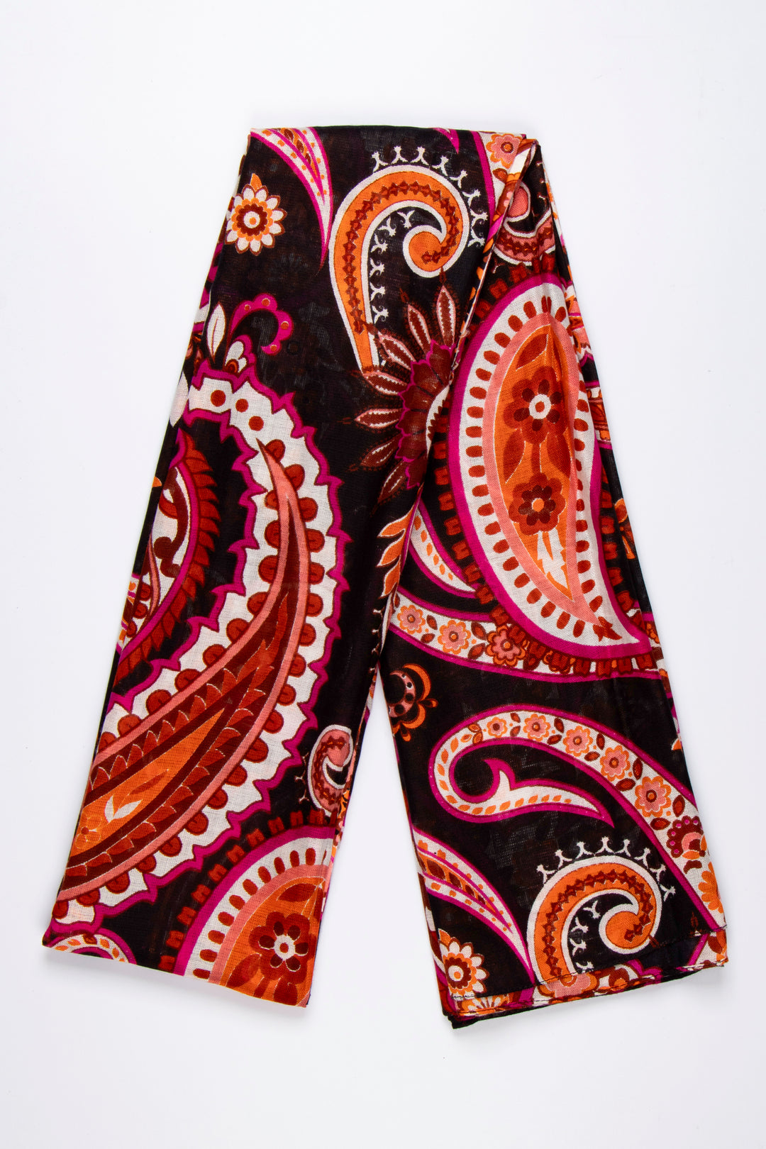 showing the scarf folded, the bold black, orange and pink paisley floral pattern is shown