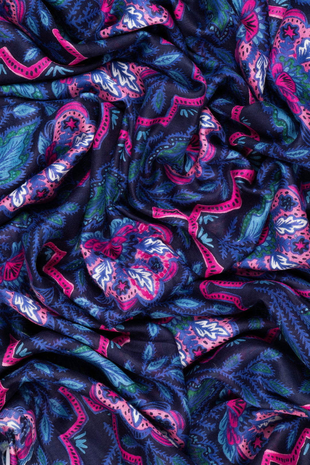 close up of the soft viscose fabric, the blue and fuchsia pink colourways are clearly visible