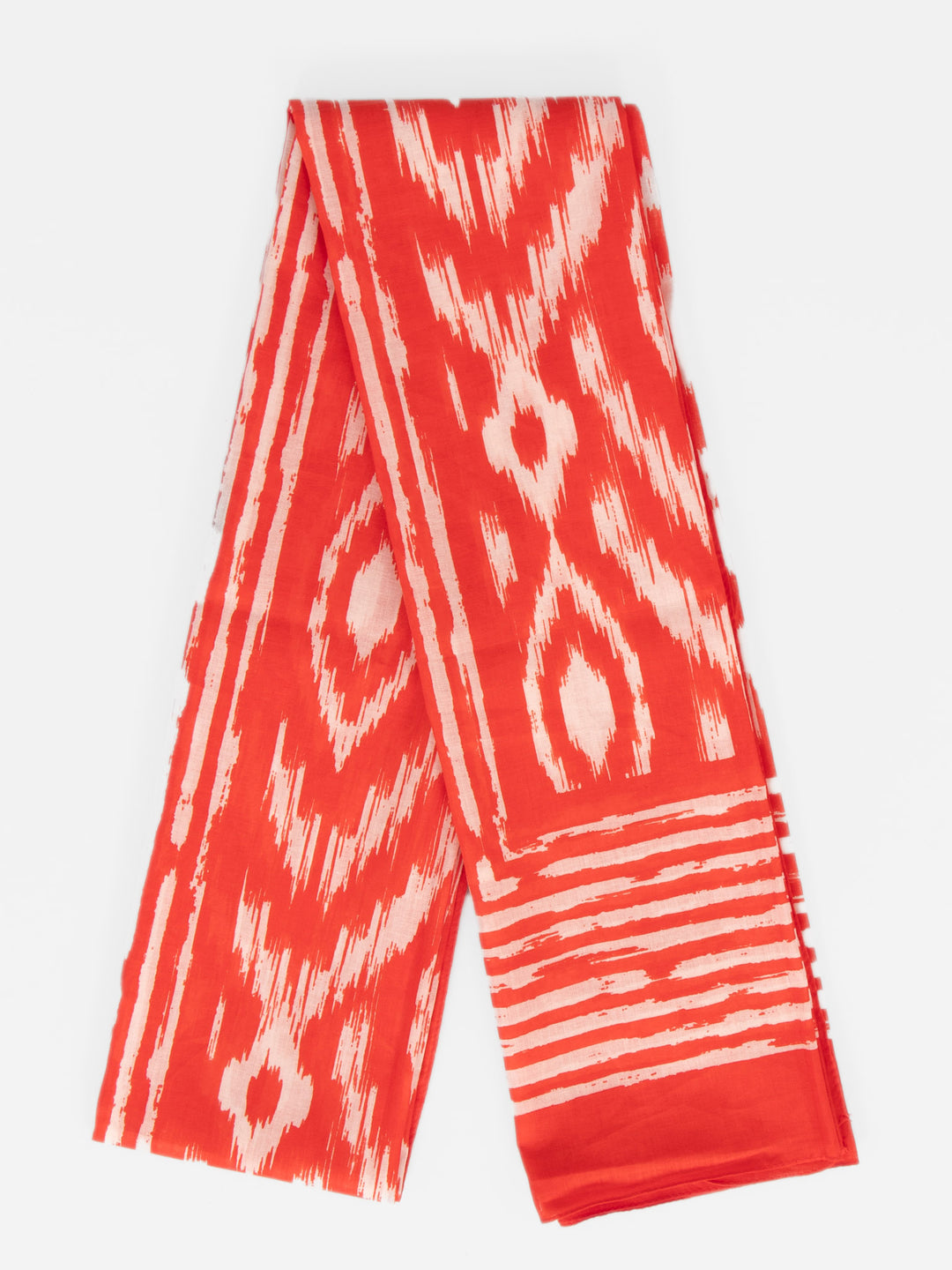 showing the scarf folded, the colourful red aztec pattern is shown to cover the design. the scarf also has a bordered edge which is partially striped.