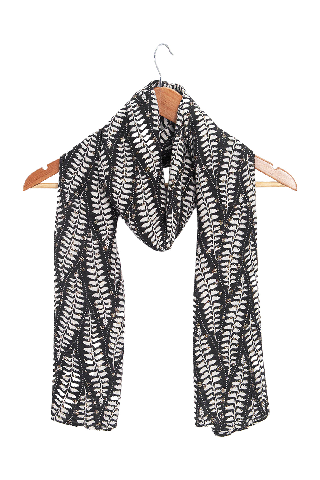 clover-black-fern-leaf-lightweight-scarf-draped-on-coat-hanger