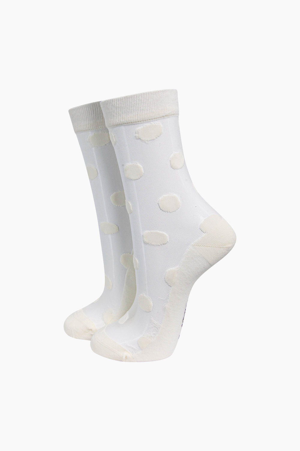 Polka-Dot-Sheer-Socks-in-Cream-On-Mannequin