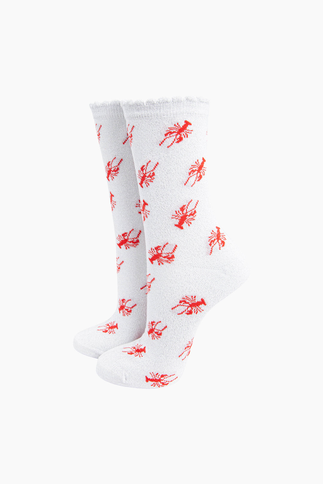 white sparkly glitter socks with scalloped cuffs and an red lobster pattern
