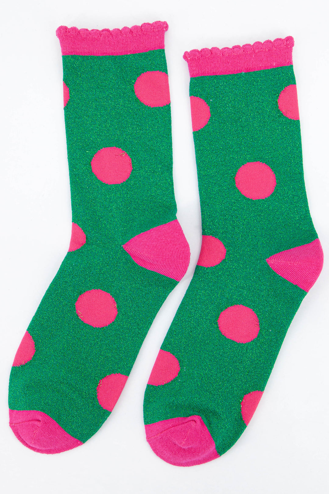 green and pink glitter ankle socks with a large scattered polka dot spot pattern 