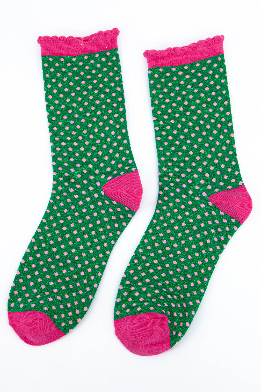 green glitter socks with an all over pink polka dot pattern