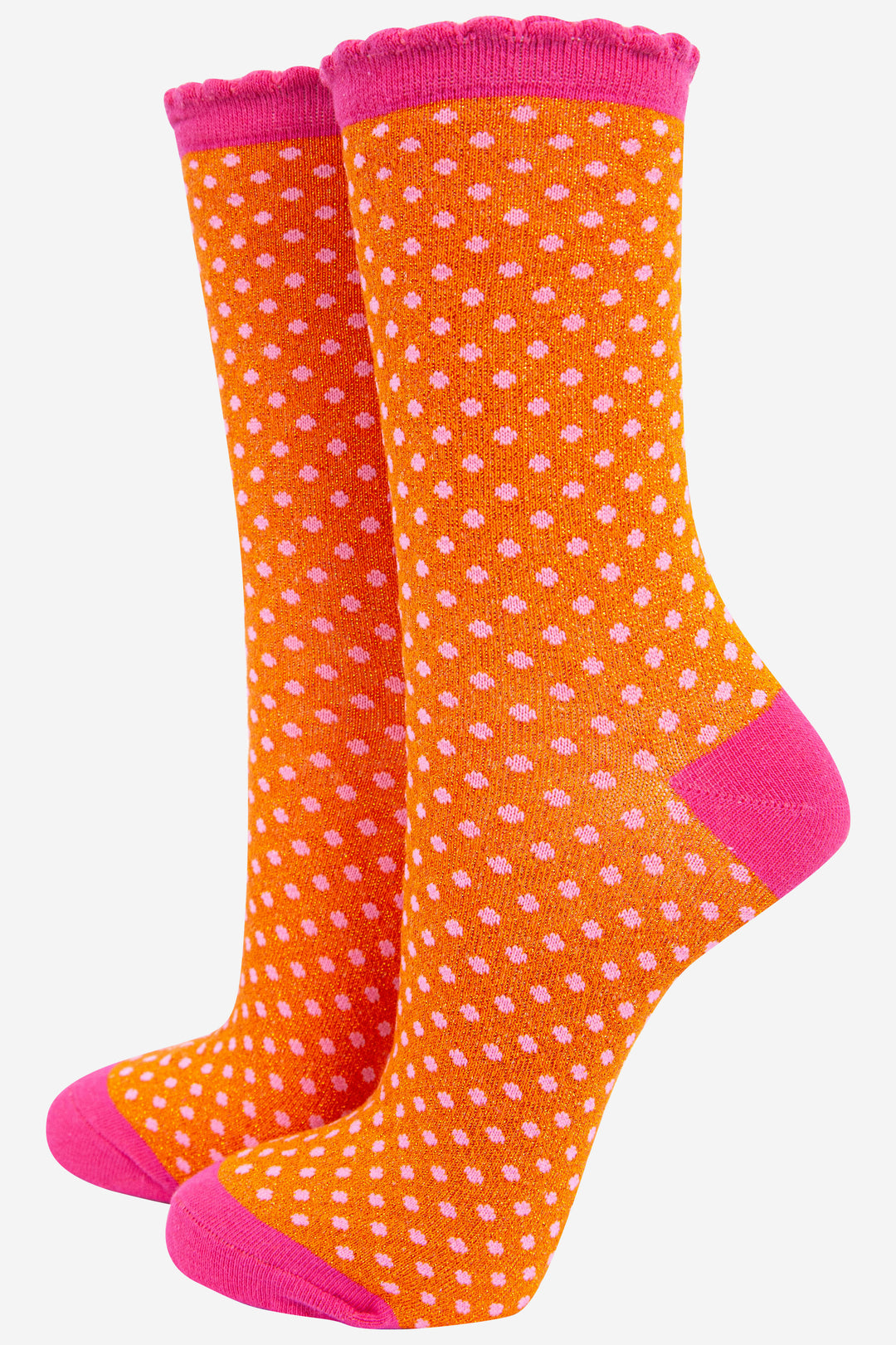 orange ankle socks with pink heel, toe and scalloped top featuring an all over polka dot pattern and sparkly glittery shimmer