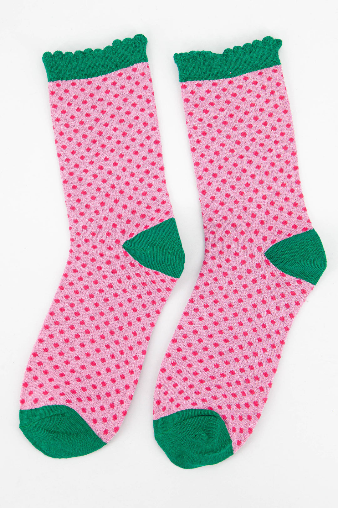 pink polka dot sparkly ankle socks with a green scalloped edge