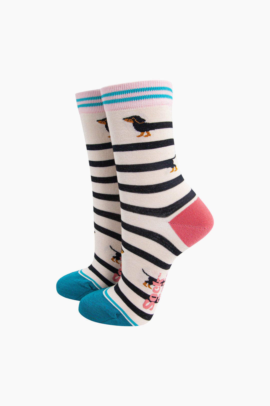 Winding-Sausage-Dog-Bamboo-Socks-in-Cream-On-Foot-Mannequin