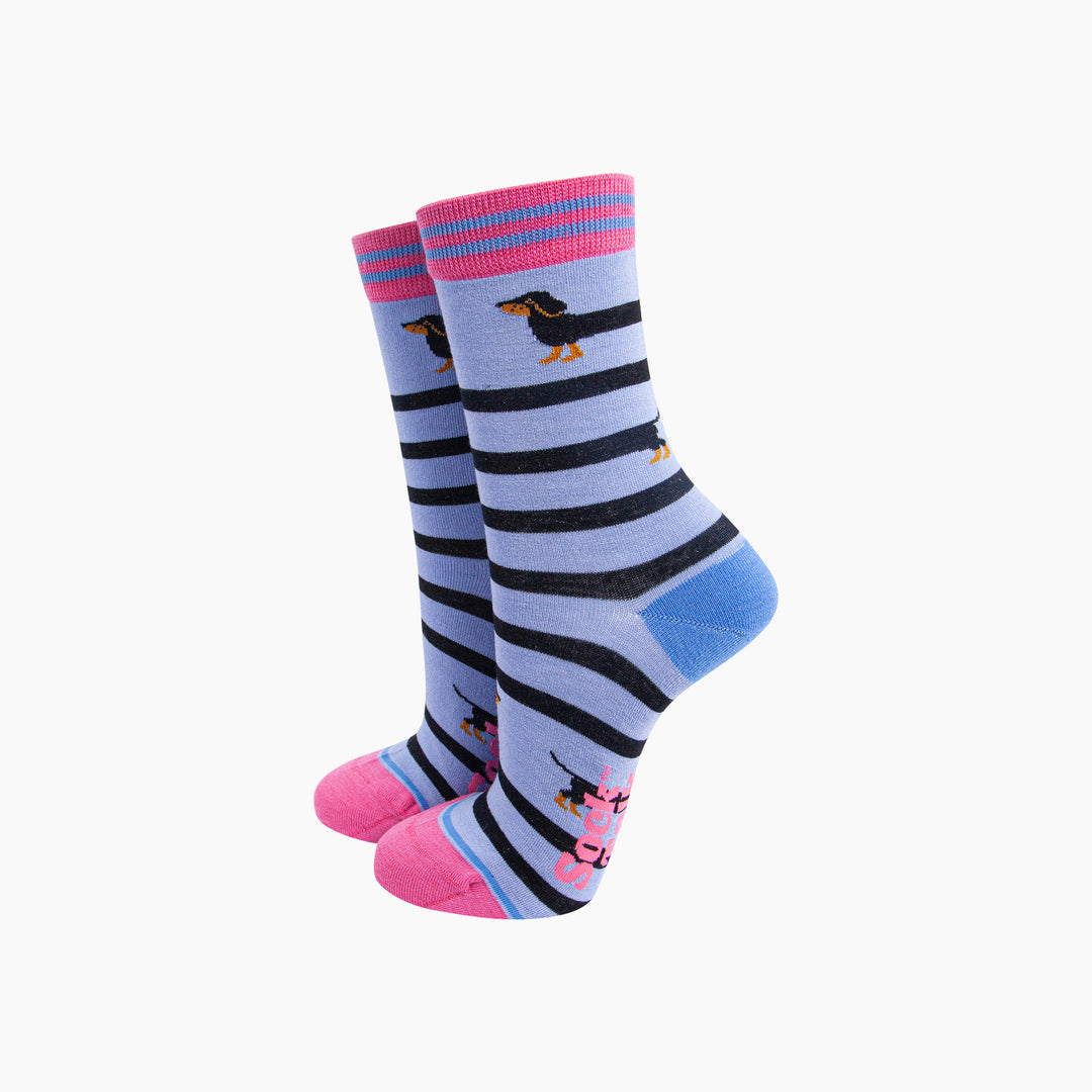Winding-Sausage-Dog-Bamboo-Socks-in-Blue-On-Foot-Mannequin