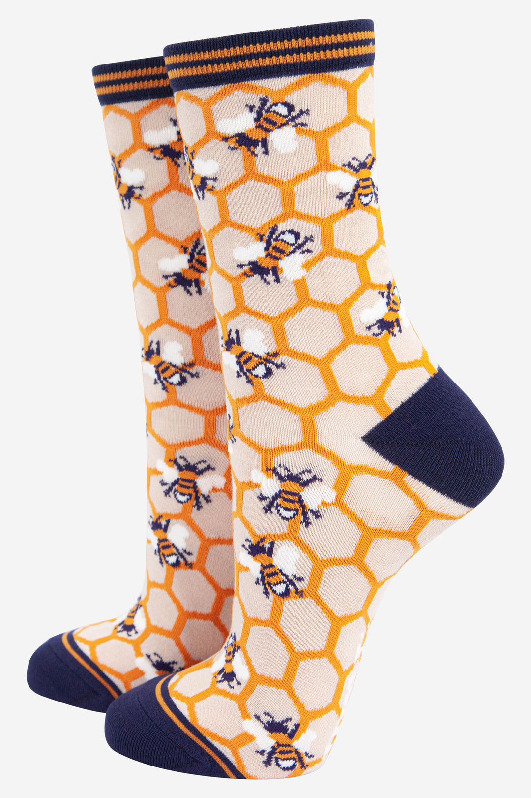 yellow and blue bamboo sock designed to look like a honeycomb with an all over pattern of bees