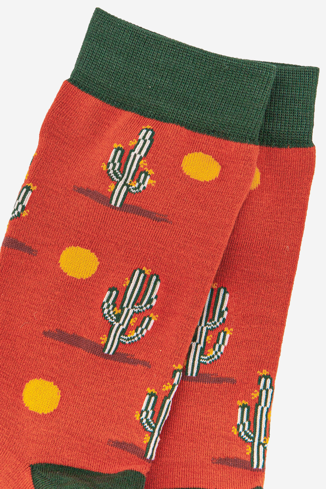 close up of the cactus and sun pattern on the bamboo socks 