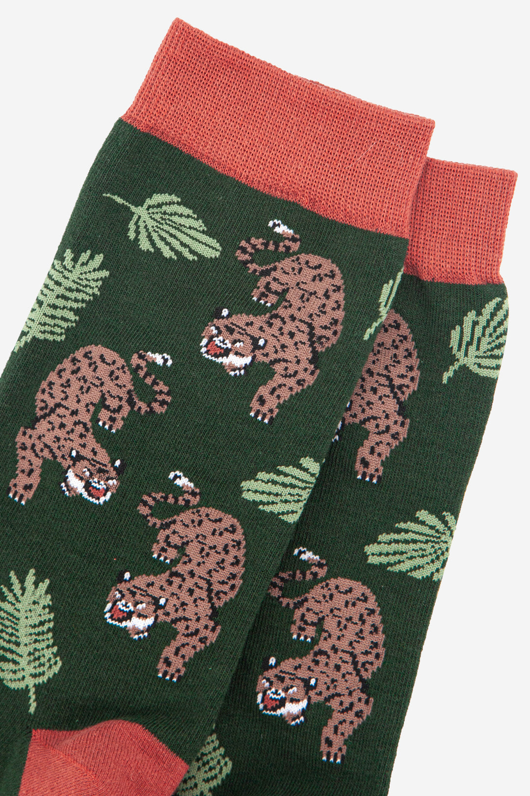 close up of the cheetah big cat pattern on the green bamboo socks