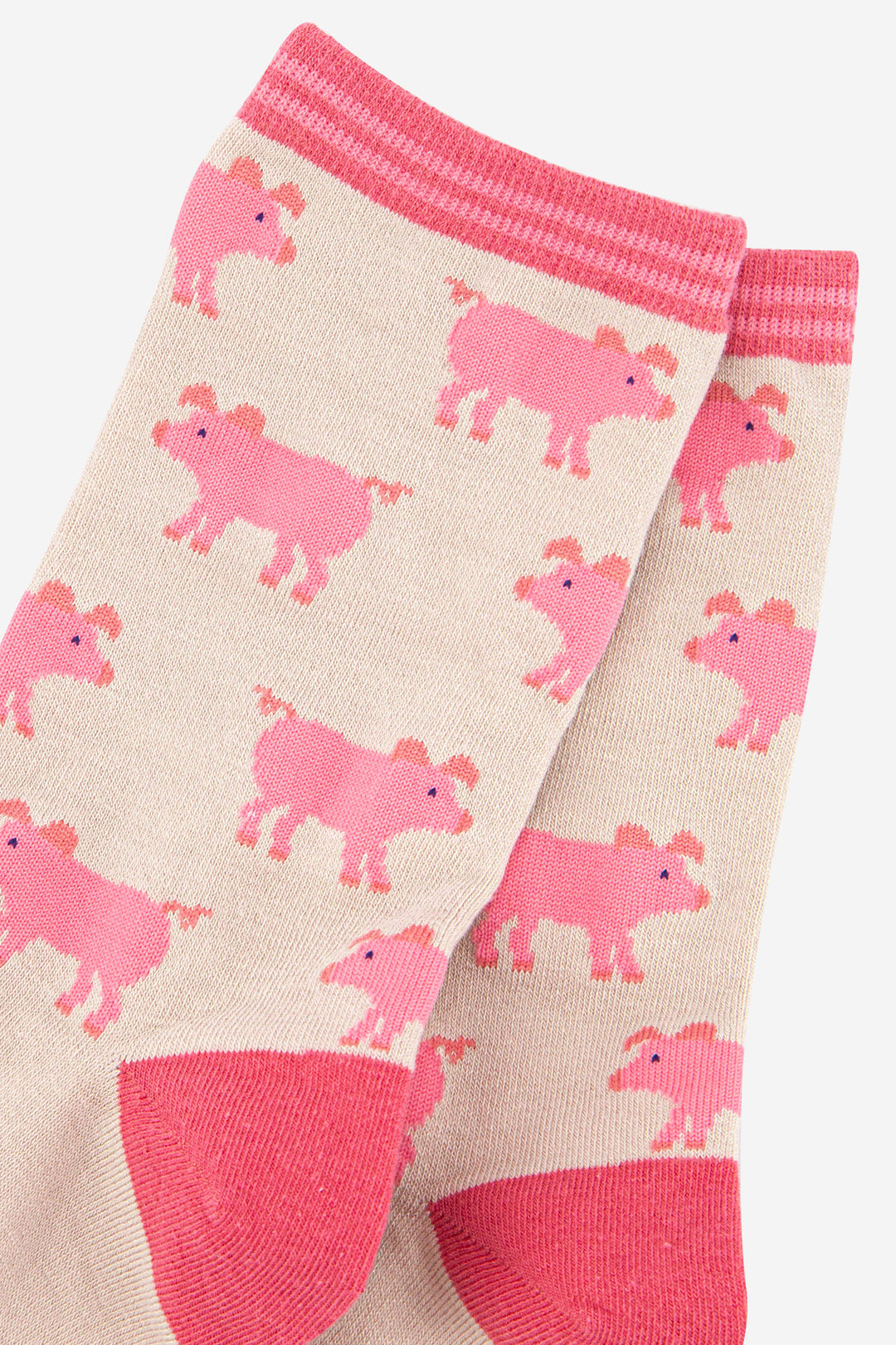 close up of the pink pig pattern on the ankle socks
