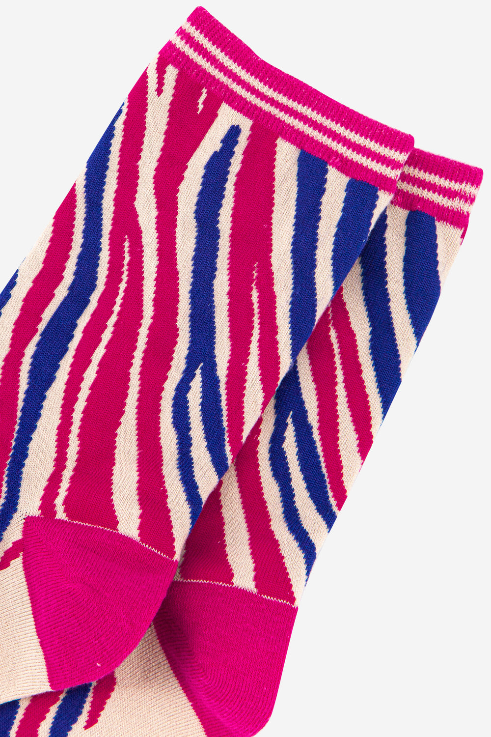 close up of the hot pink and blue zebra print pattern