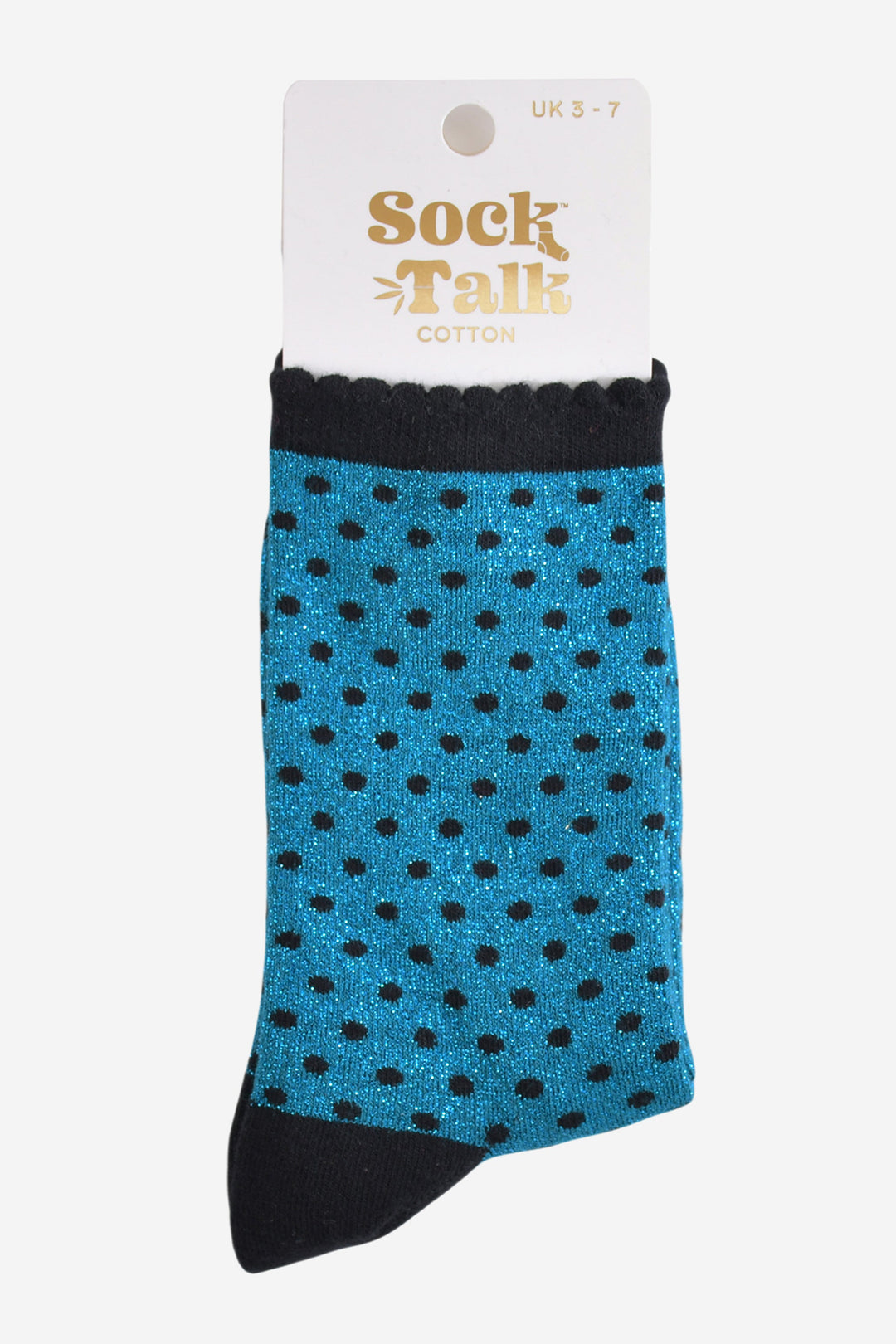 teal and black polka dot glitter socks in their sock talk packaging, the socks are a uk size 3-7