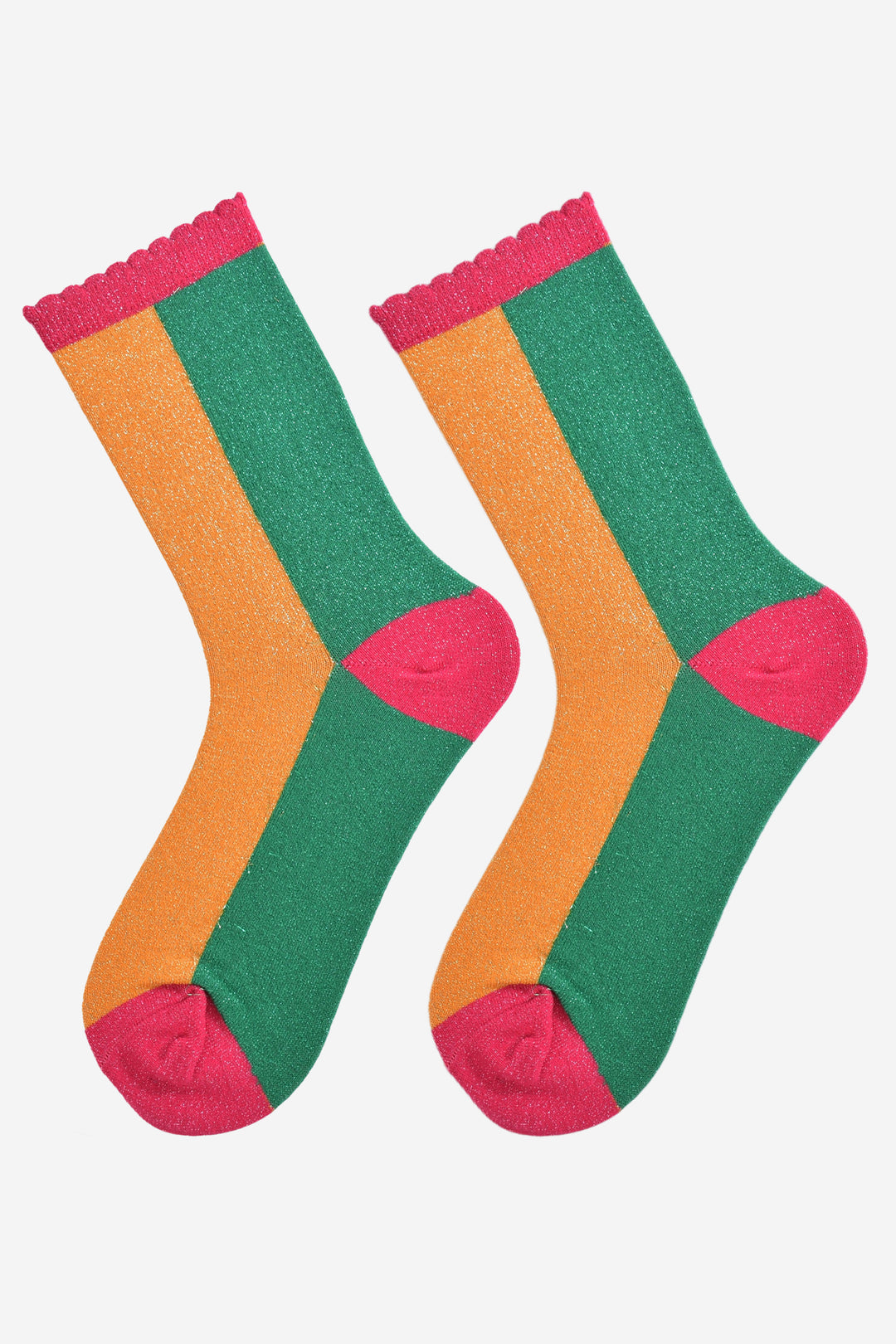 showing the green and orange colour block socks laying flat, they have contrasting pink heel, toe and cuffs and an all over silver glitter sparkle