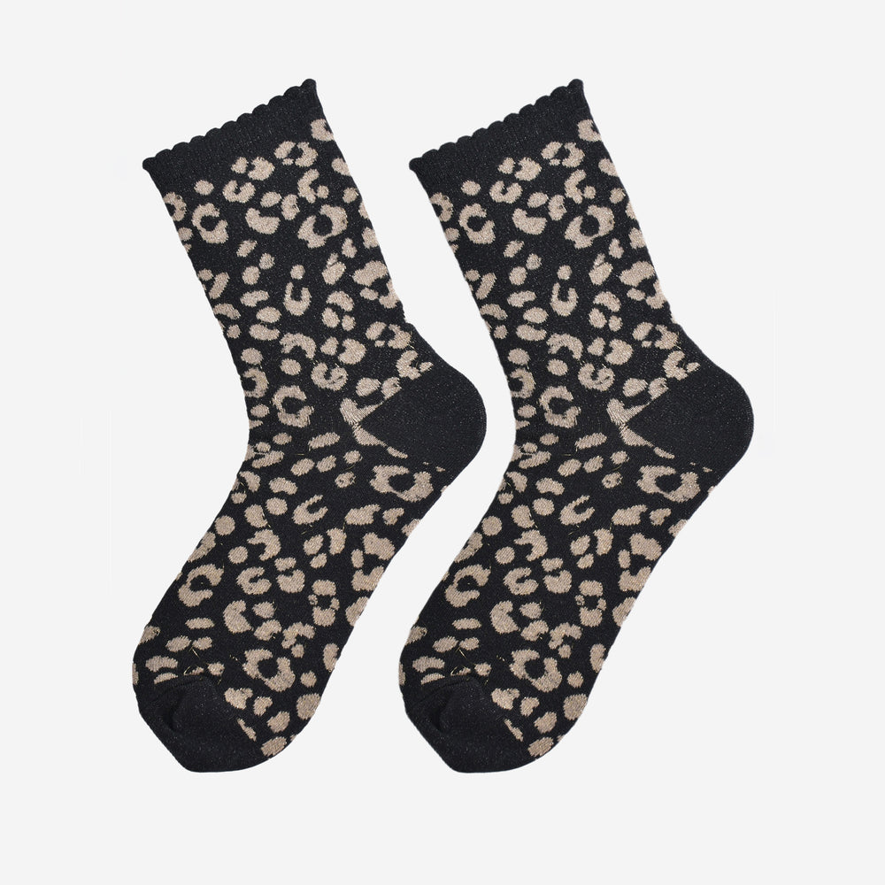 showing the gold and black leopard print ankle socks laying flat, the all over silver sparkle is visible