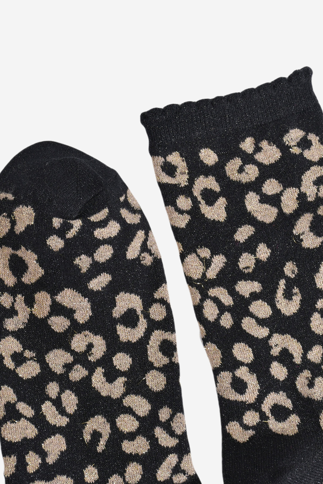 showing the toe and cuff of the ankle socks, both are black with silver sparkles, the cuff has a scalloped edge