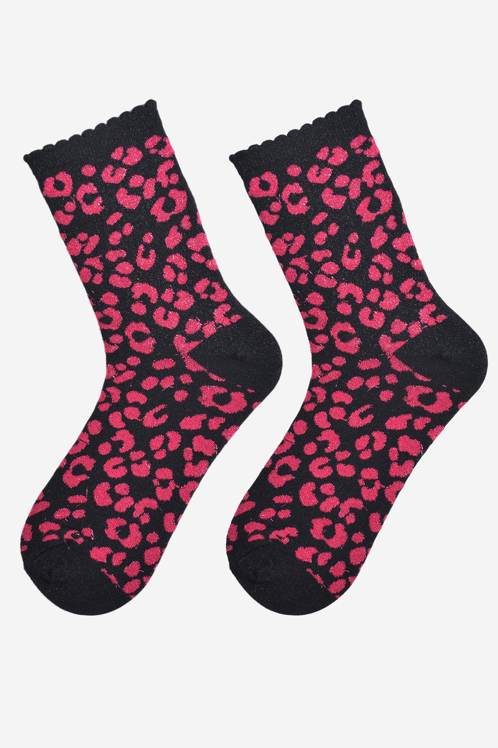 showing the pink and black leopard print ankle socks laying flat, the all over silver sparkle is visible