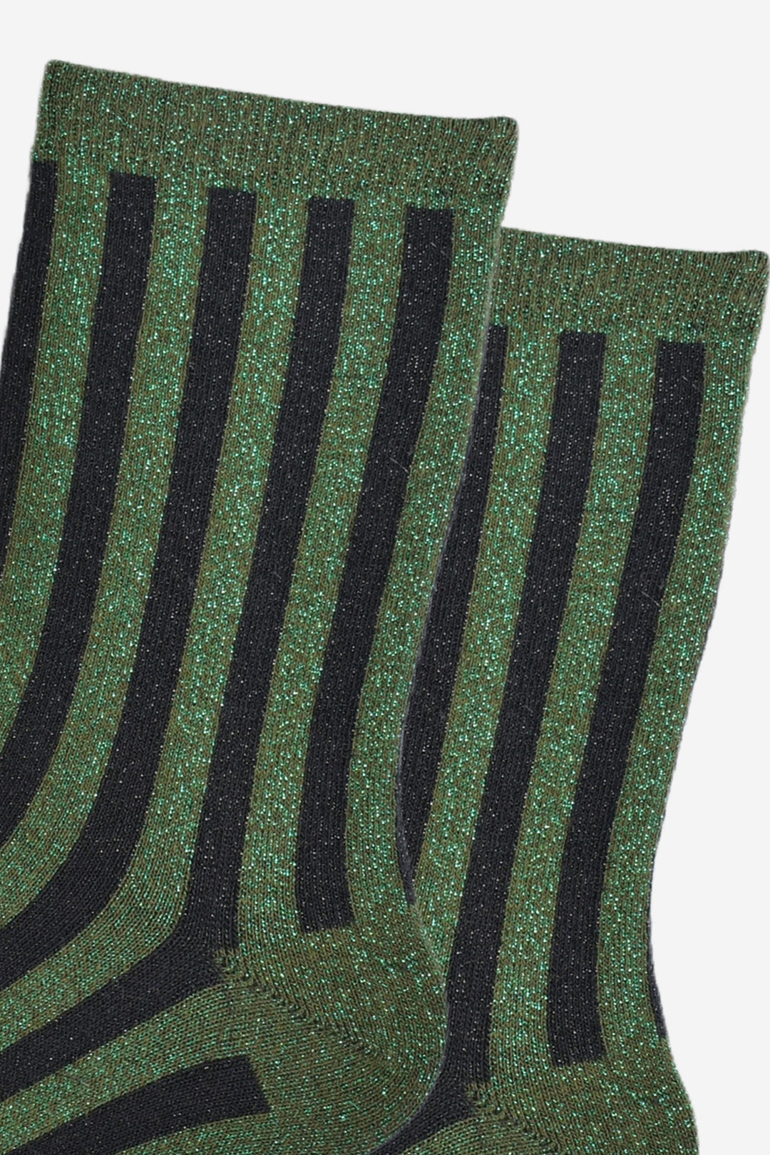 close up of the khaki green and black vertical striped pattern on the socks. there is an all over silver glitter sparkle