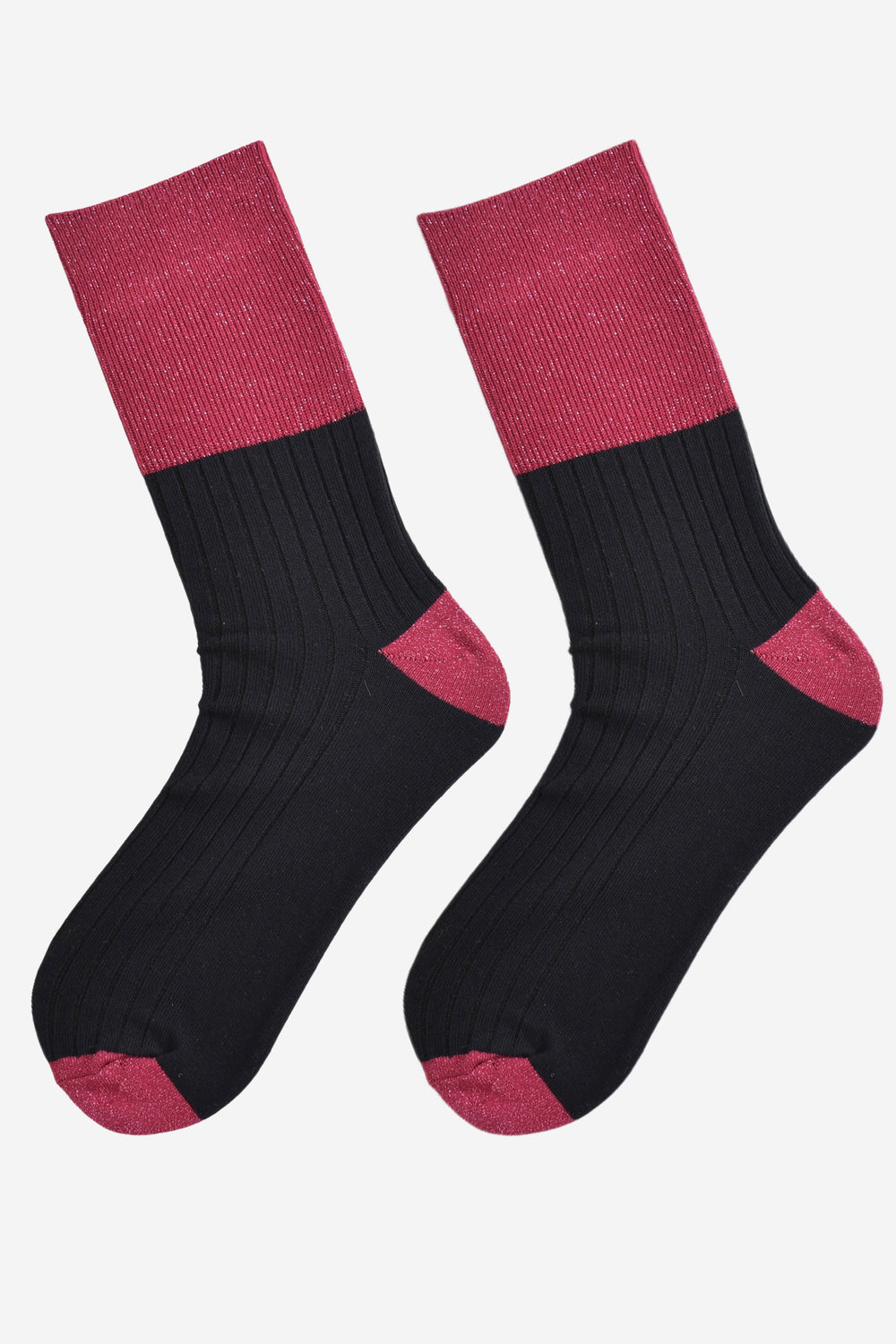 showing the socks laying flat, the body of the socks is black ribbed cotton and is contrasted by the glitter sparkly long cuff in berry pink, the cuff can be worn folded down or up