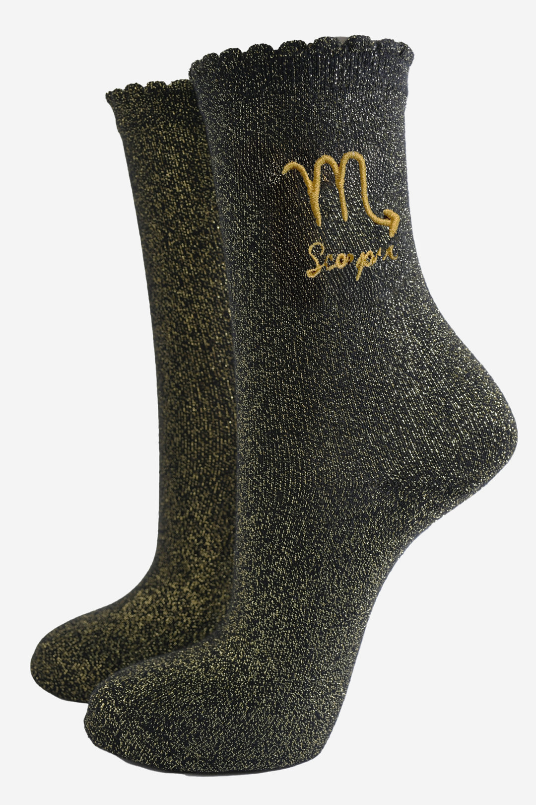 black and gold sparkly ankle socks with a scalloped cuff and an gold embroidered scorpio zodiac symbol and name