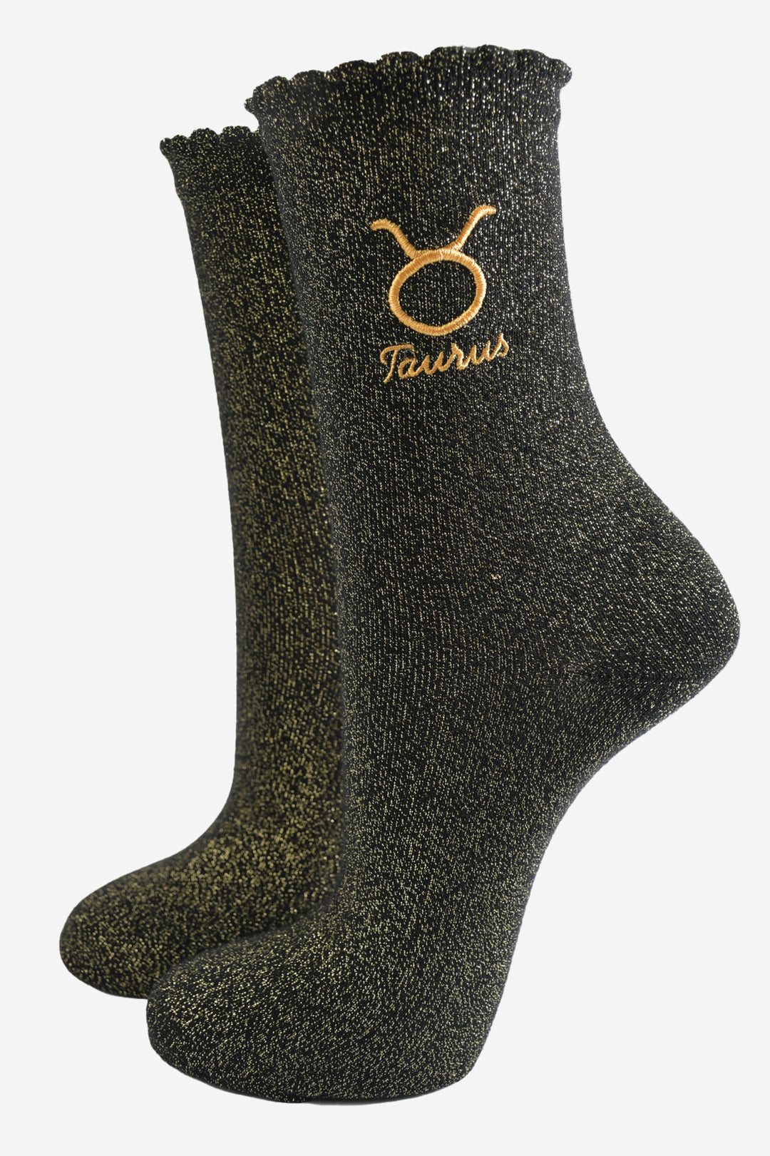 black and gold sparkly ankle socks with a scalloped cuff and an gold embroidered taurus zodiac symbol and name