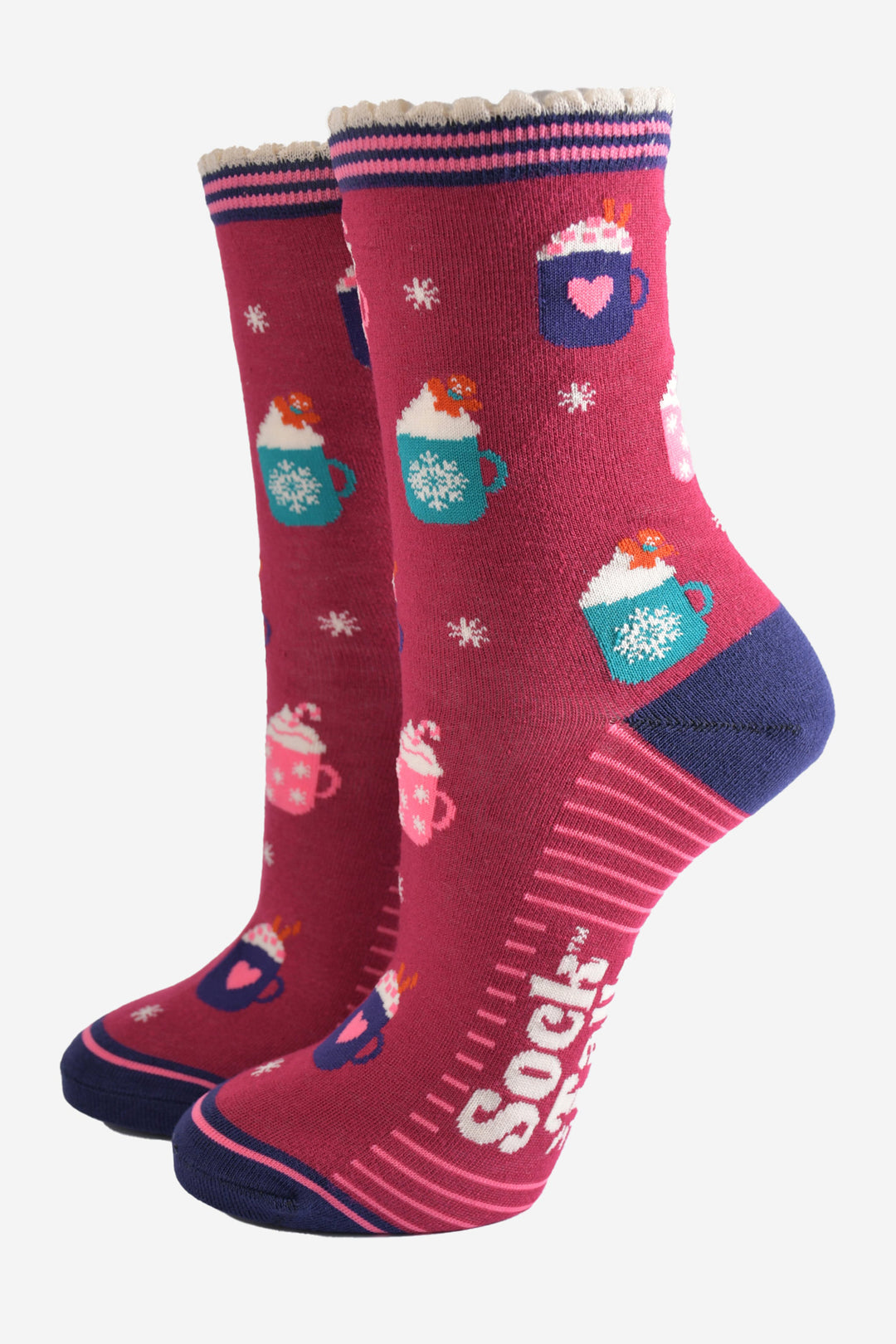 berry red bamboo socks with a pattern of hot winter drinks, candy canes and gingerbread men