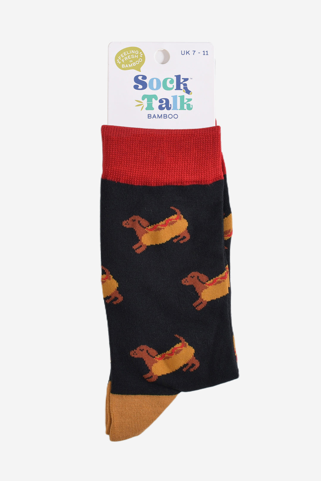 sausage dog hotdog socks in their sock talk packaging, the socks are a uk size 7-11