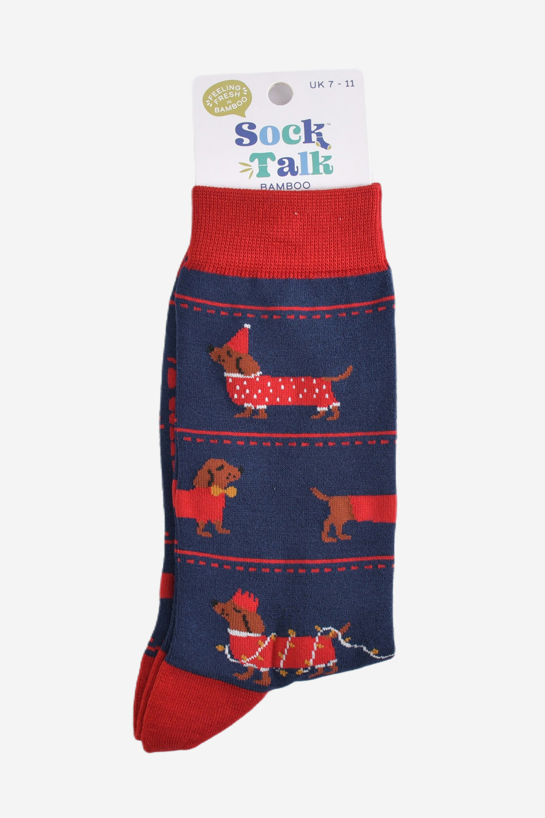 sausage dog party bamboo socks in their sock talk packaging, these socks are a uk size 7-11