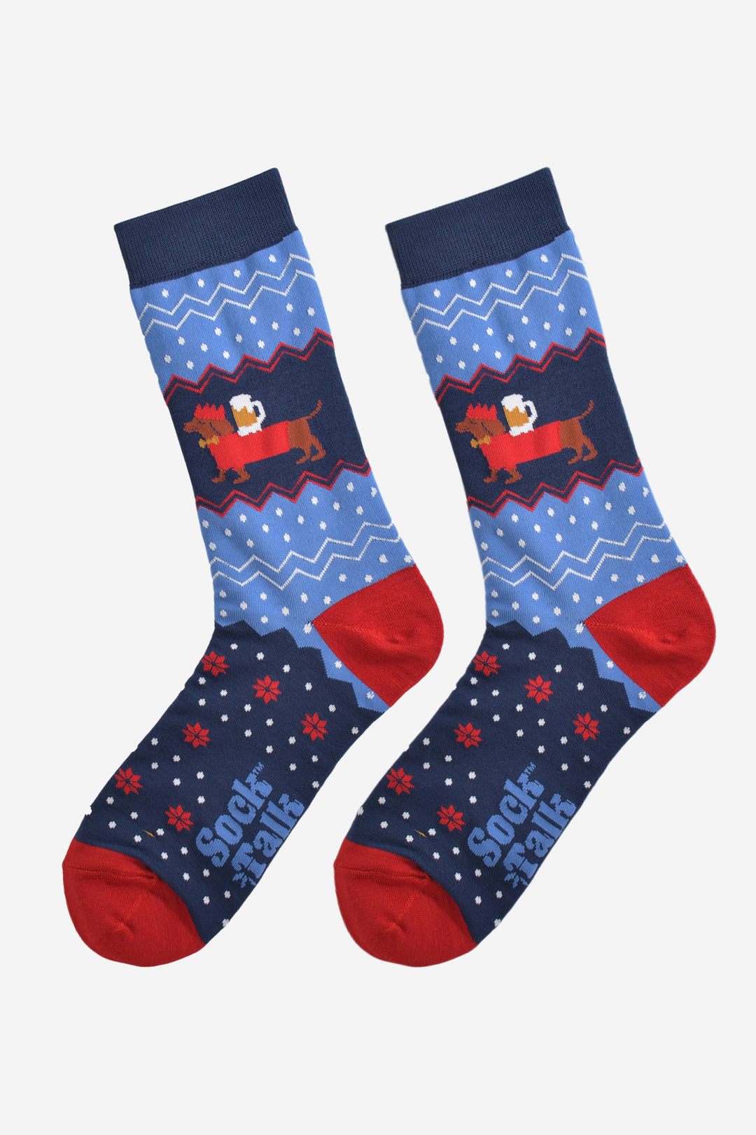 sausage dog beer socks laying flat, showing the blue and red fair isle pattern and the sausage dog carrying a pint of beer on its back