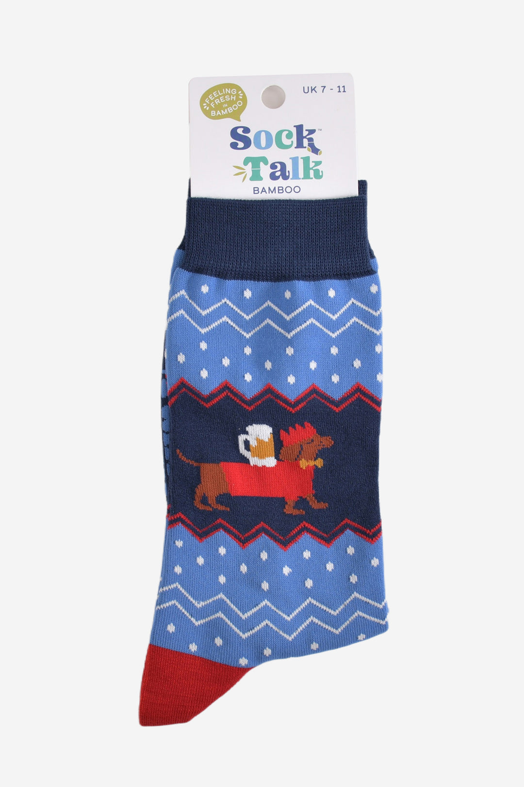 sausage dog carrying a pint of beer bamboo socks in their sock talk packaging, these socks are a uk size 7-11