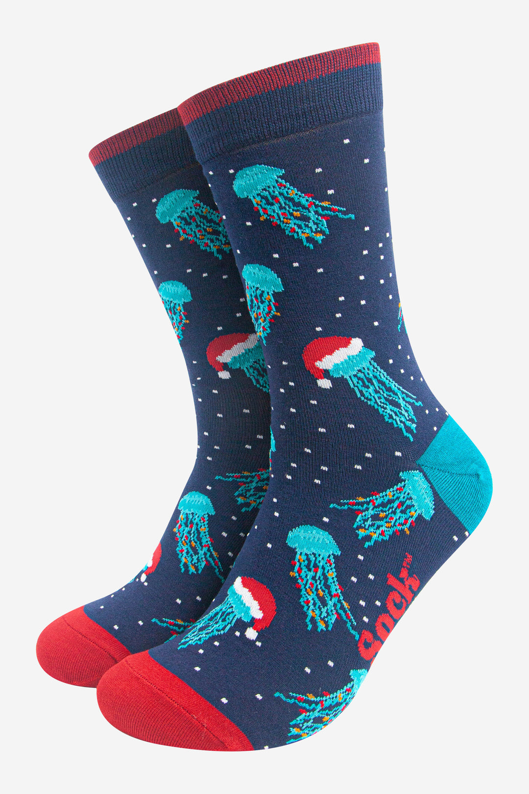 navy blue socks with red toe, cuff and an electric blue heel, there is a pattern of electric blue jellyfish wearing santa hats and party lights all over the socks