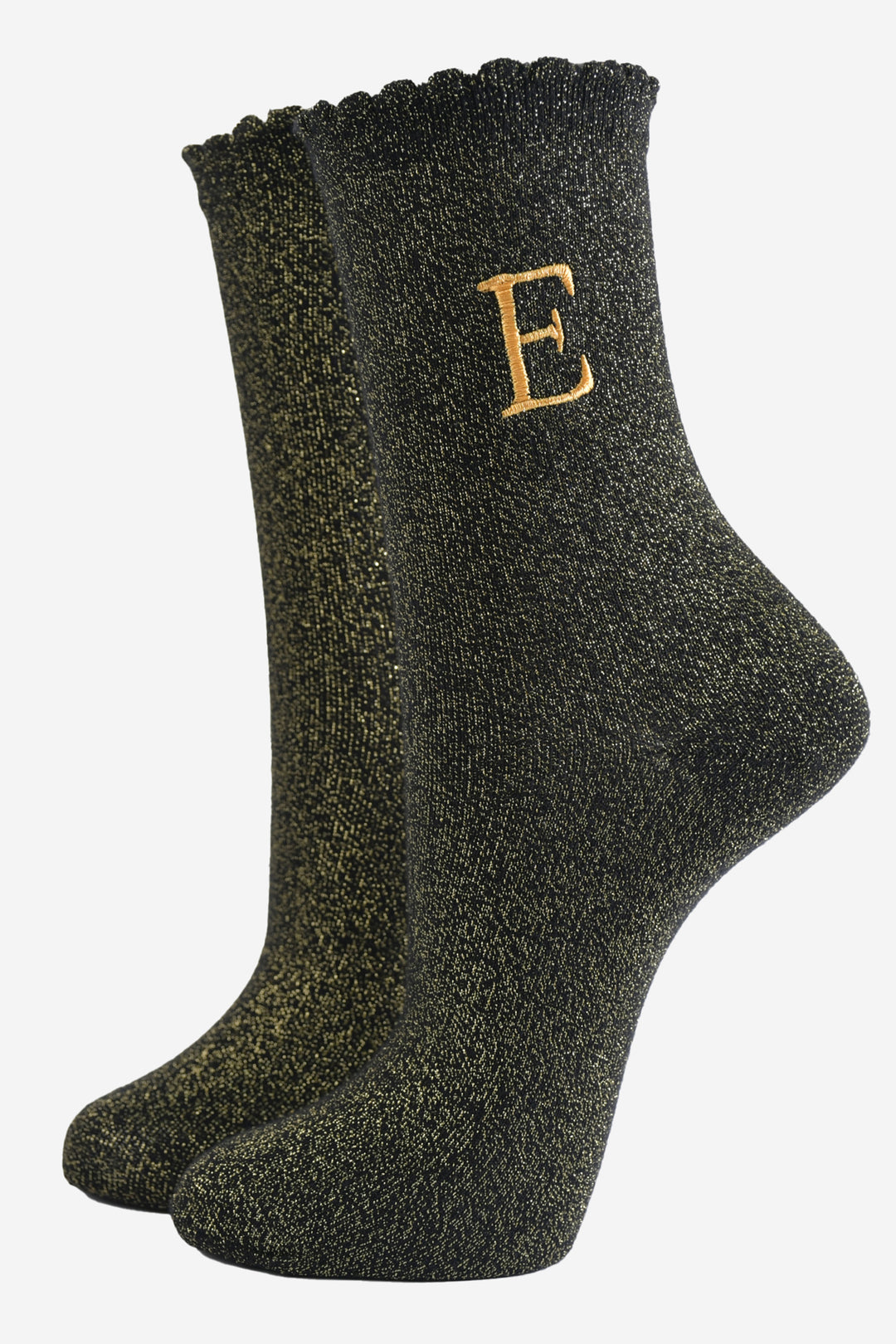 black ankle socks with a scalloped cuff, with an all over gold glitter sparkle and an embroidered gold letter e on the ankle