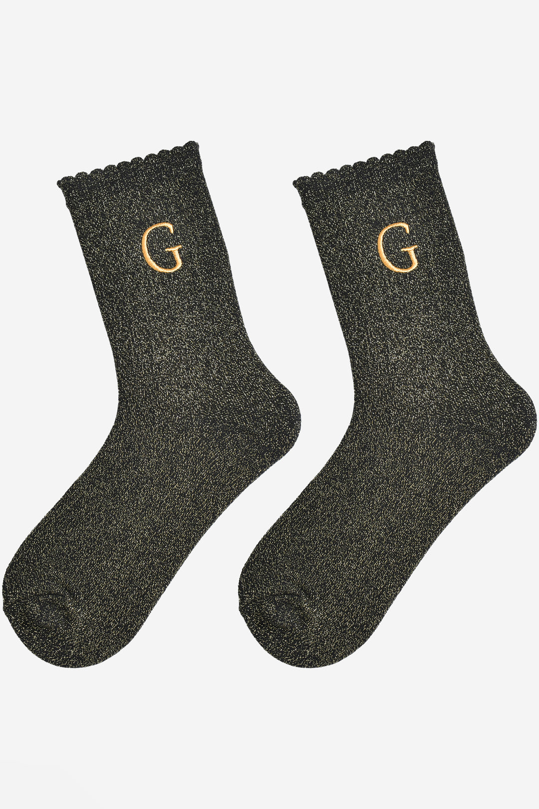 showing the glitter socks laying flat, they have a scalloped cuff and an all over gold sparkle