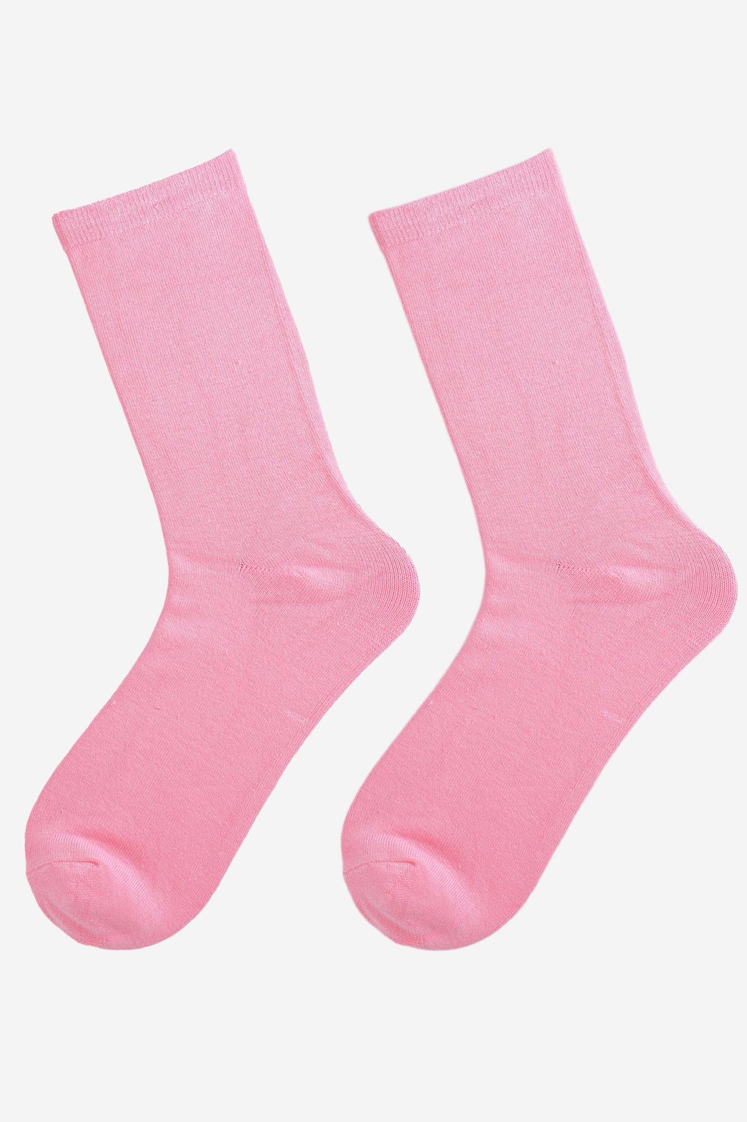 showing the pink bamboo socks laying flat, showing the solid plain colourway of the socks.