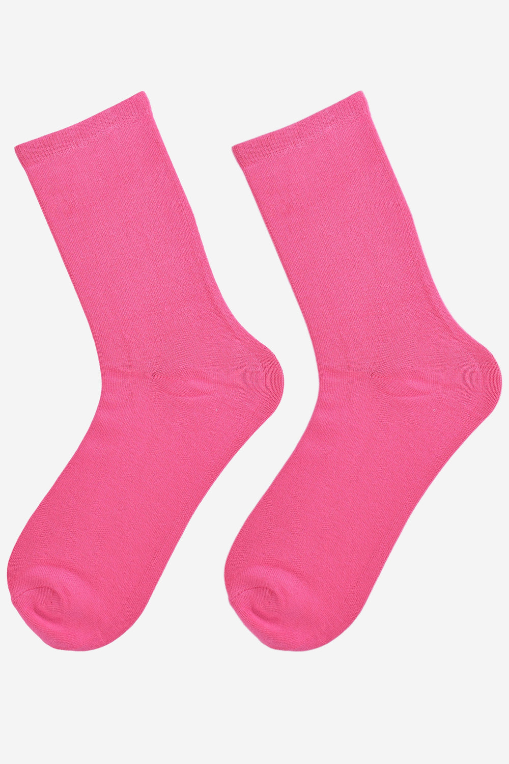 showing the hot pink bamboo socks laying flat, showing the solid plain colourway of the socks.