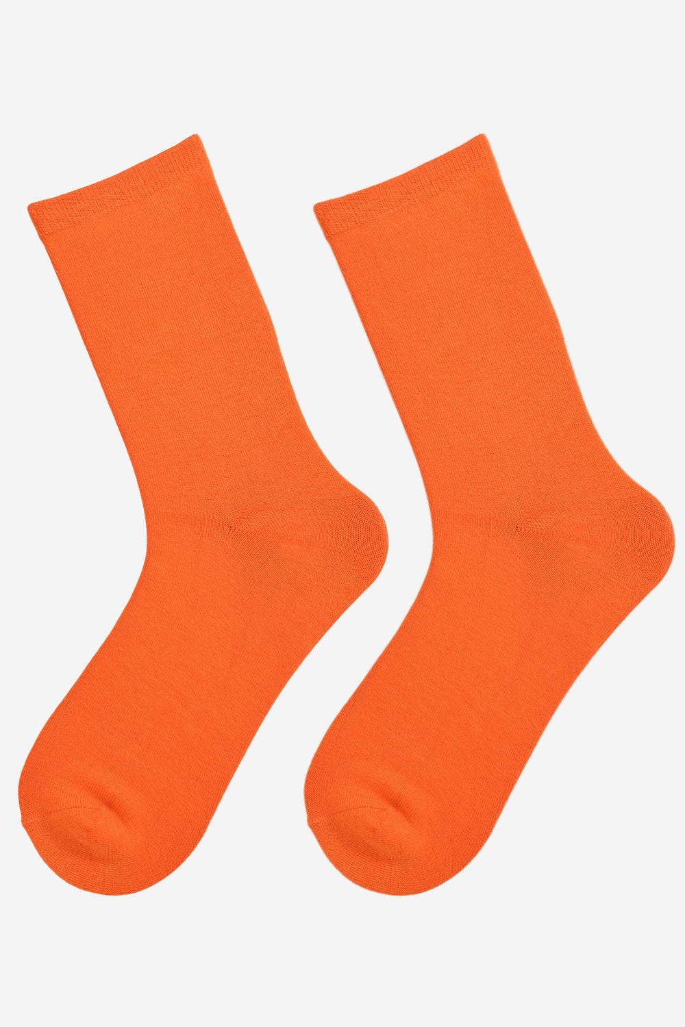 showing the orange bamboo socks laying flat, showing the solid plain colourway of the socks.