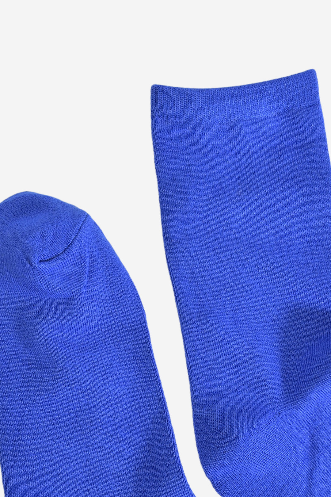 close up of the cuff and toe, both are plain royal blue the same as the base of the socks. the cuff is straight cut.